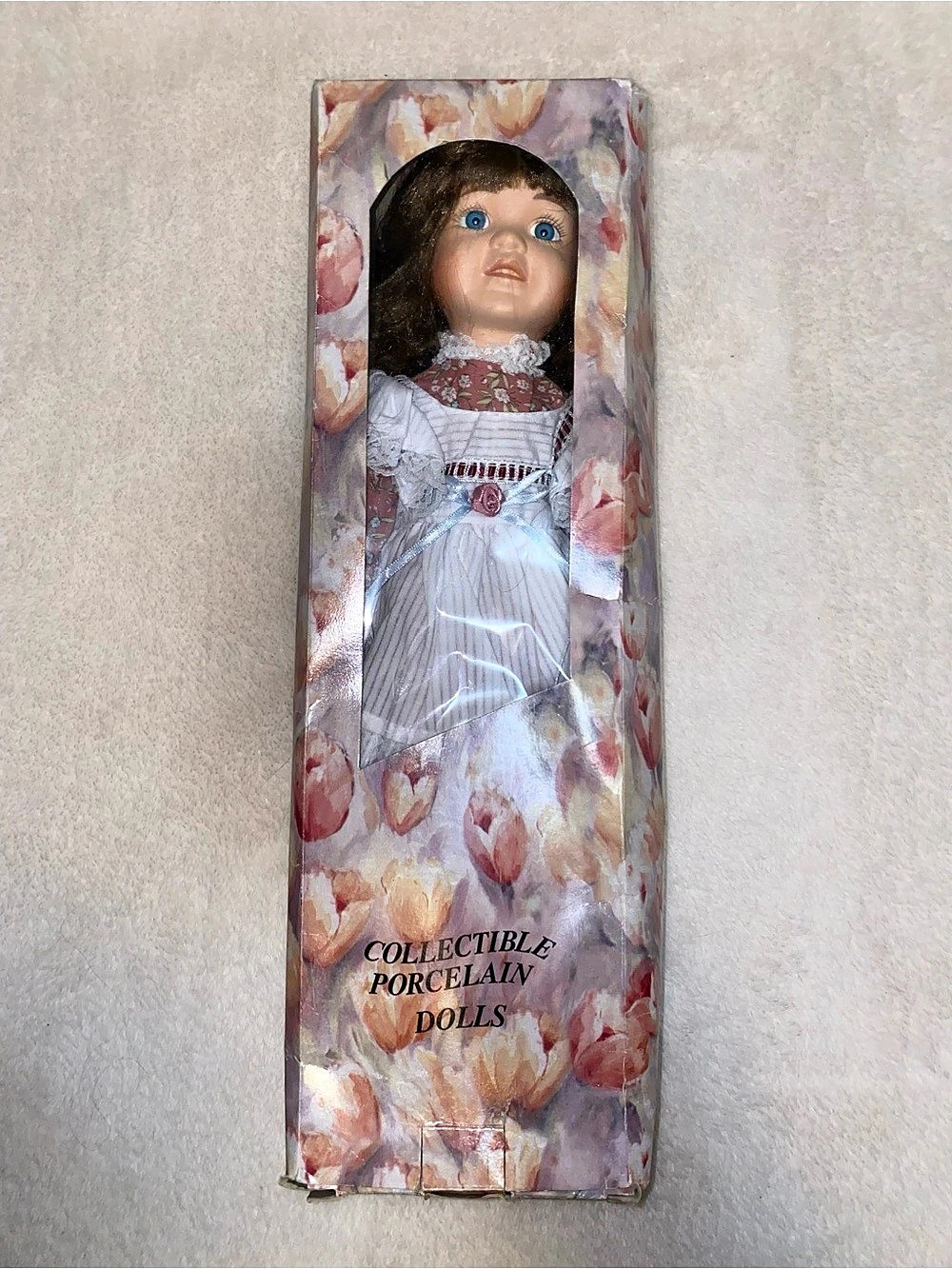 Collectible Porcelain Doll in Pink & White
